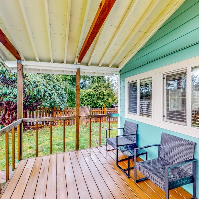 Renovated dog friendly cottage with a covered porch deck yard and washer dryer